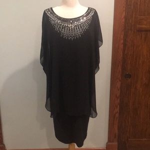 Beautiful black dress with rhinestone details.